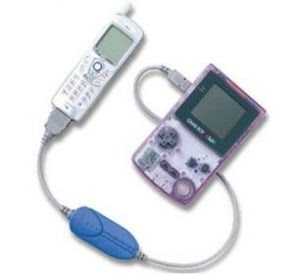 Press image of a Mobile Adapter GB connected to a Game Boy Color.